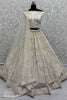 Ravishing Cream Color Sequins Net Wedding Lehenga Choli With Dupatta