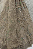 Attractive Beige Zircon Work Net Designer Lehenga Choli With Dupatta