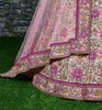 Prominent peach Colored Bridal wear Embroidered Lehenga Choli