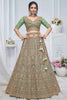 Charming Green Embroidered Net Mehendi Wear Lehenga Choli