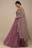 Outstanding Dark Mauve Sequins Georgette Party Wear Lehenga Choli