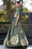 Lavish Bottle Green Floral Print Tussar Silk Crop Top Lehenga With Jacket