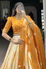 Tantalizing Mustard Yellow Shibori Printed Dola Silk Lehenga With Blouse