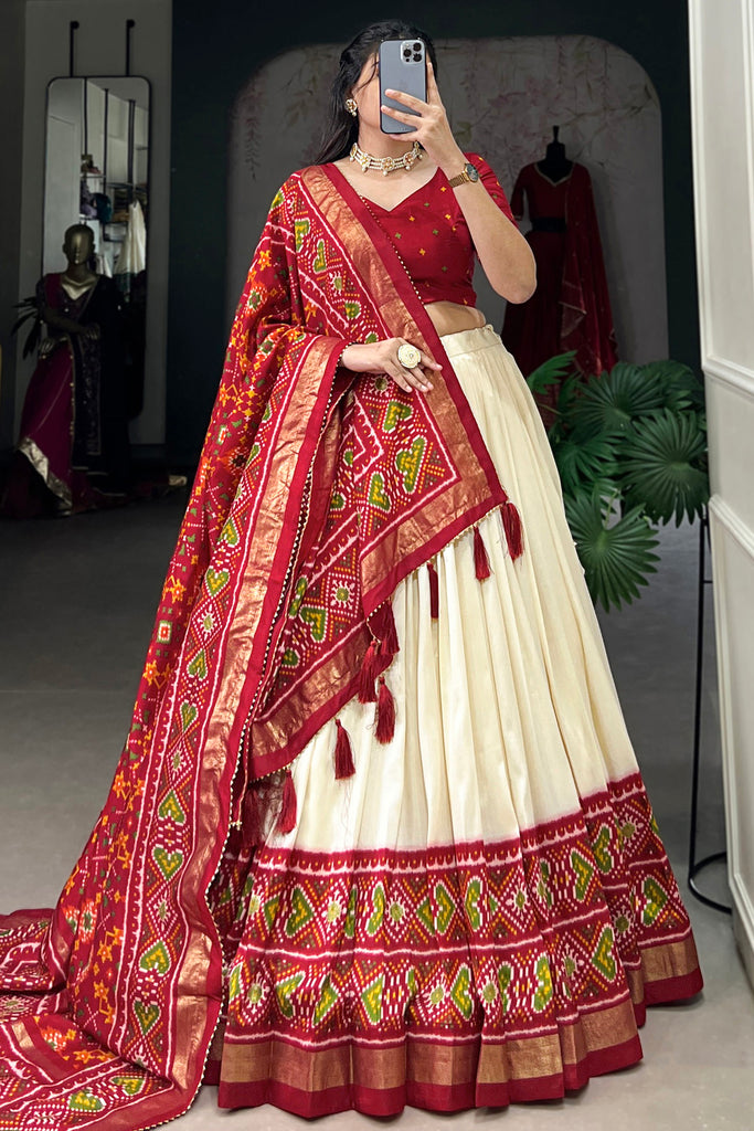 Dazzling Red Patola Printed Tussar Silk Festival Wear Lehenga Choli