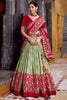 Beautiful Sage Green Ikkat Printed Silk Festival Wear Lehenga Choli