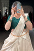Wonderful Cream Border Work Silk Onam Special Half Saree Lehenga