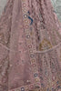 Beautiful Peach Sequins Net Engagement Wear Lehenga Choli