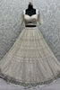 Lovely White Pearl Work Net Wedding Wear Lehenga Choli With Dupatta