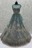 Magnetic Blue Zari Embroidered Net Engagement Wear Lehenga Choli With Dupatta