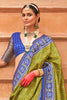 Alluring Olive Green Patola Print Silk Festival Wear Saree With Blouse