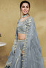 Lovely Grey Foil Work Net Engagement Wear Lehenga Choli With Dupatta