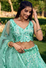 Lovely Turquoise Sequins Net Reception Wear Lehenga Choli