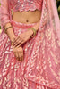 Ravishing Pink Sequins Net Bridesmaid Lehenga Choli With Dupatta