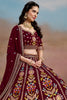 Astonishing Maroon Sequins Georgette Reception Wear Lehenga Choli