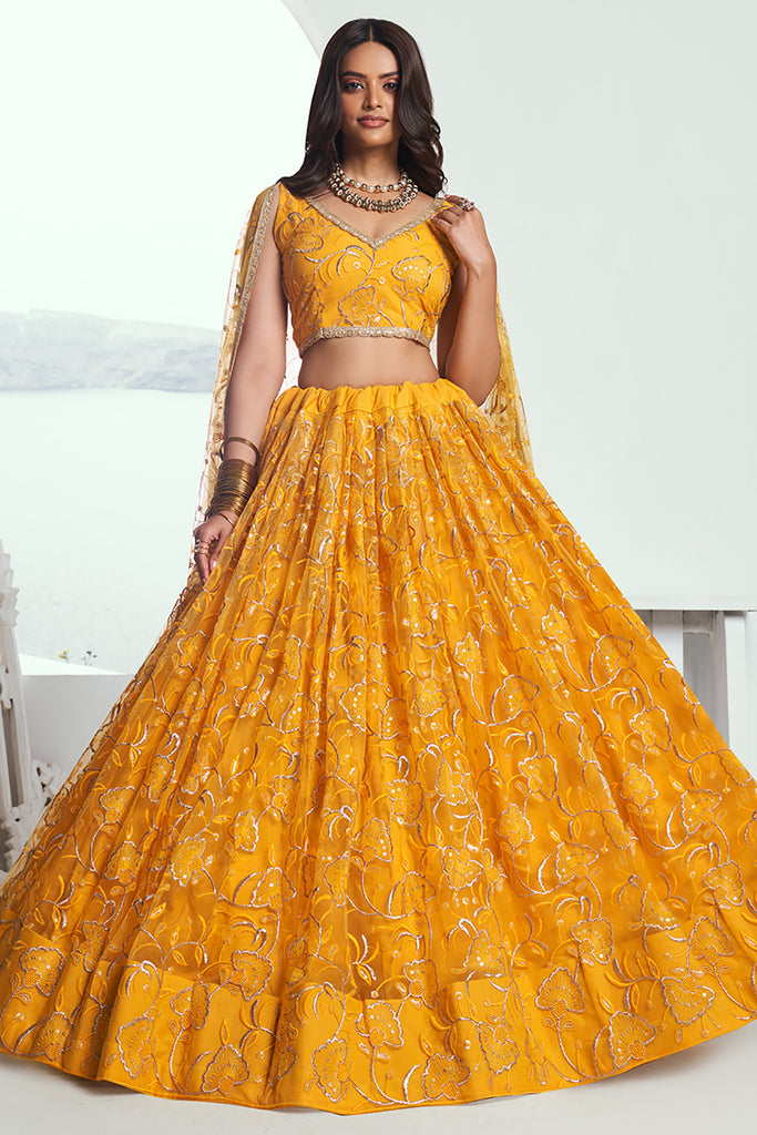 Alluring Yellow Embroidered Net Wedding Lehenga Choli With Dupatta