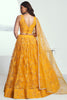 Alluring Yellow Embroidered Net Wedding Lehenga Choli With Dupatta