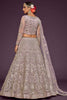 Beautiful Lilac Embroidered Soft Net Wedding Wear Lehenga Choli