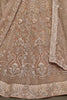 Winsome Beige Embroidered Soft Net Engagement Wear Lehenga Choli