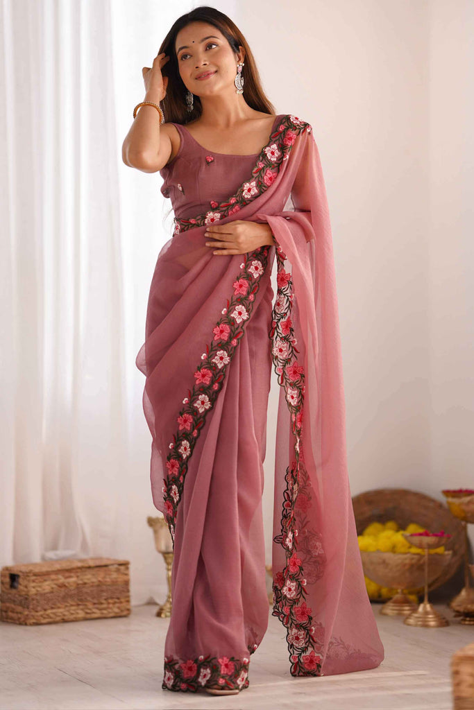 Tantalizing Dusty Pink Embroidered Georgette Reception Wear Saree