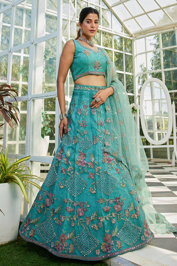 Lovely Teal Blue Embroidered Net Engagement Wear Lehenga Choli