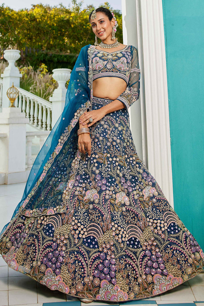 Dazzling Blue Thread Work Net Wedding Lehenga Choli With Dupatta