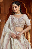 Lovely Pista Green Embroidered Tissue Silk Wedding Lehenga Choli