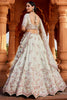 Lovely Pista Green Embroidered Tissue Silk Wedding Lehenga Choli