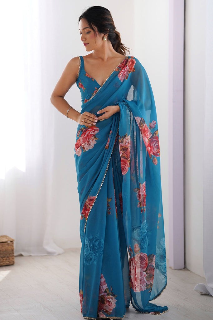 Alluring Blue Floral Print Georgette Casual Wear Saree With Blouse