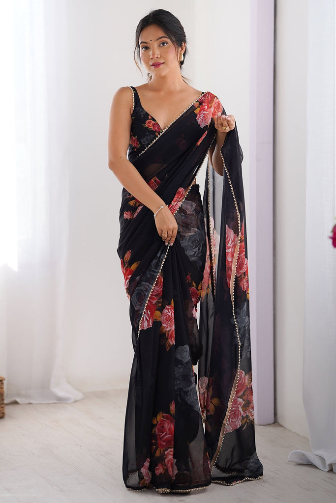 Alluring Black Floral Print Georgette Casual Wear Saree With Blouse