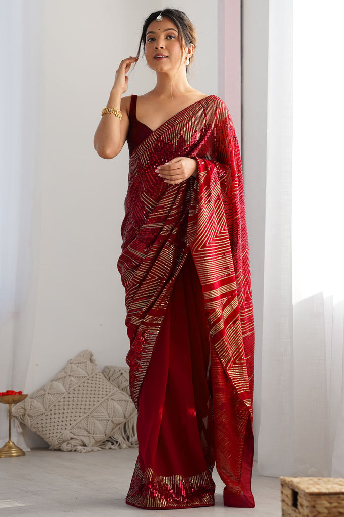 Captivating Maroon Sequins Work Georgette Reception Wear Saree