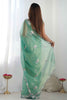 Enchanting Sea Green Sequins Net Reception Wear Saree With Blouse