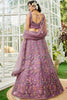 Wonderful Purple Embroidered Net Reception Wear Lehenga Choli