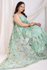 Alluring Sea Green Thread Embroidered Net Saree With Blouse