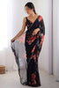 Alluring Black Floral Print Georgette Casual Wear Saree With Blouse