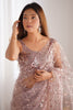 Enthralling Mauve Sequins Work Net Party Saree With Blouse