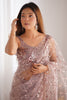 Enthralling Mauve Sequins Work Net Party Saree With Blouse