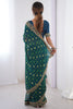 Memorable Teal Blue Printed Georgette Function Wear Saree With Blouse