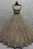 Captivating Golden Zircon Work Net Wedding Lehenga Choli With Dupatta