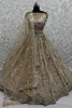 Stunning Golden Embroidered Net Wedding Wear Lehenga Choli