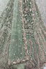 Bewitching Pista Green Sequins Net Designer Lehenga Choli