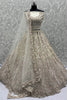 Beautiful Cream Dori Work Net Reception Wear Lehenga Choli