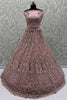 Tantalizing Peach Sequins Net Engagement Wear Lehenga Choli