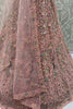 Tantalizing Peach Sequins Net Engagement Wear Lehenga Choli