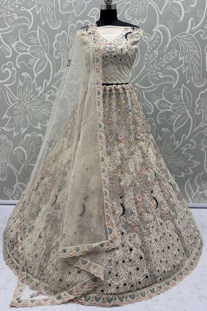 Attractive White Zari Embroidered Net Reception Wear Lehenga Choli 