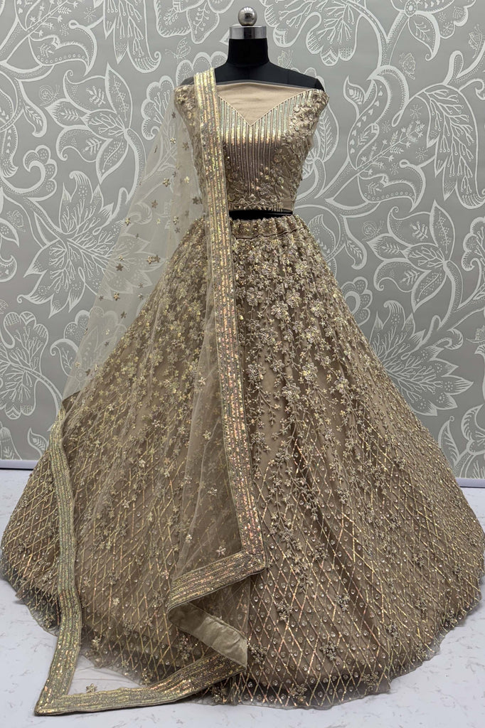 Magnetic Beige Multi-Thread Work Net Designer Lehenga Choli With Dupatta