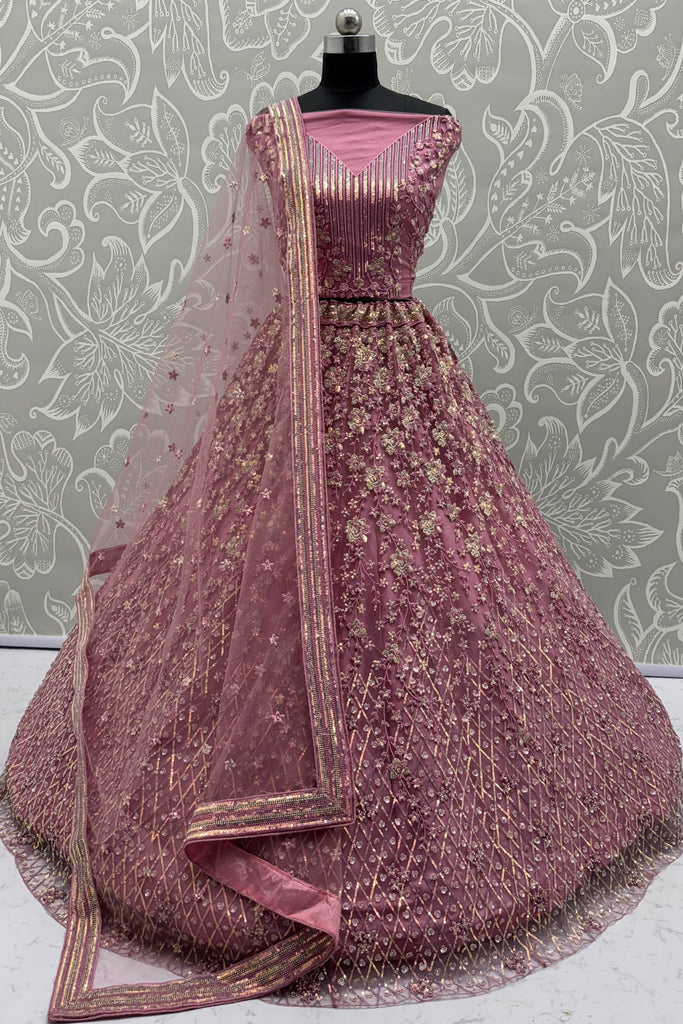 Fascinating Pink Sequins Net Engagement Wear Lehenga Choli With Dupatta