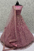 Fascinating Pink Sequins Net Engagement Wear Lehenga Choli With Dupatta