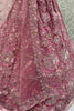 Outstanding Pink Sequins Net Bridesmaid Lehenga Choli With Dupatta