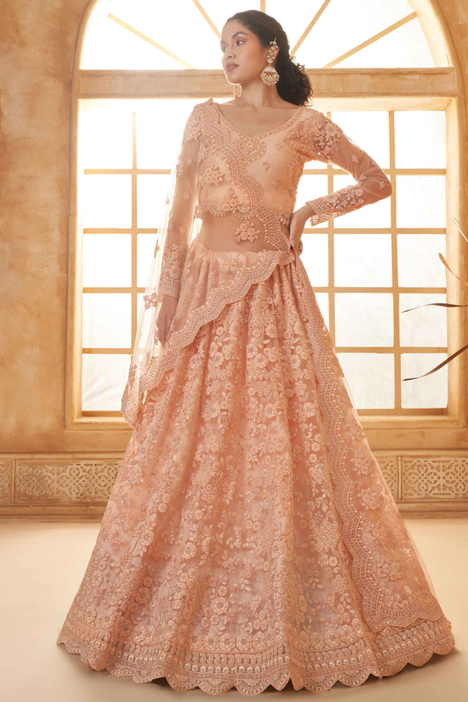 Gorgeous Peach Thread Embroidery Work Net Wedding Wear Lehenga Choli