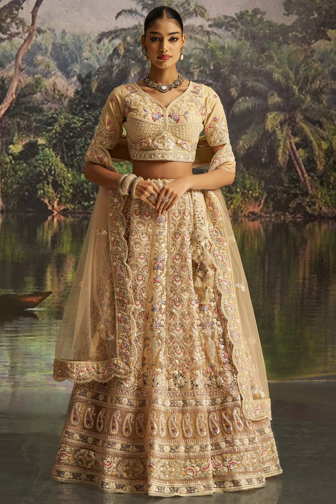 Marvelous Cream Dori Embroidered Net Designer Lehenga Choli With Dupatta